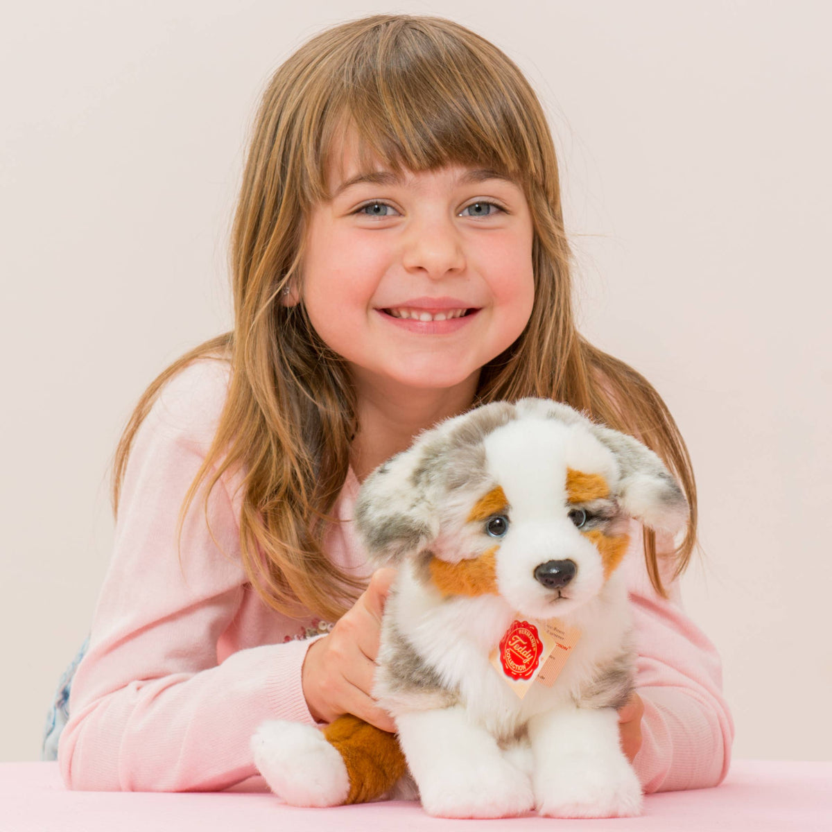 Teddy Hermann - Australian Shepherd puppy sitting 22 cm - plush toy - fabric